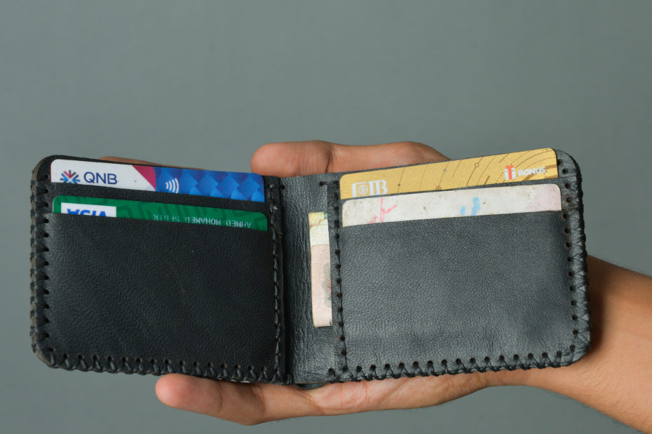 Close up photo of a black leather wallet