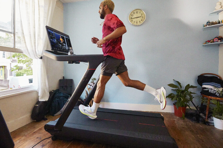 Man running on a Peloton Tread