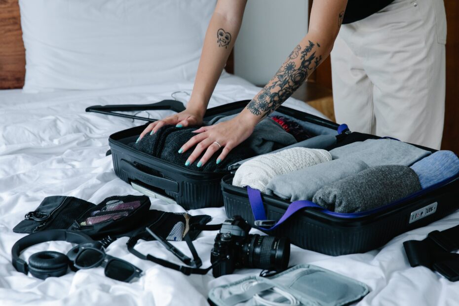 Woman packing a suitcase