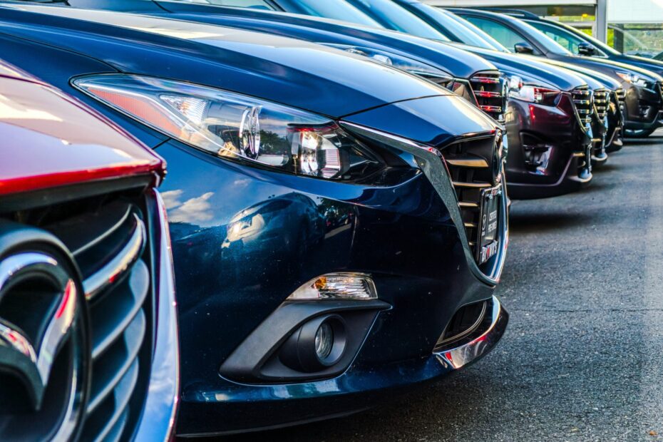 A row of Mazda 3s at a dealership in Fairfax VA