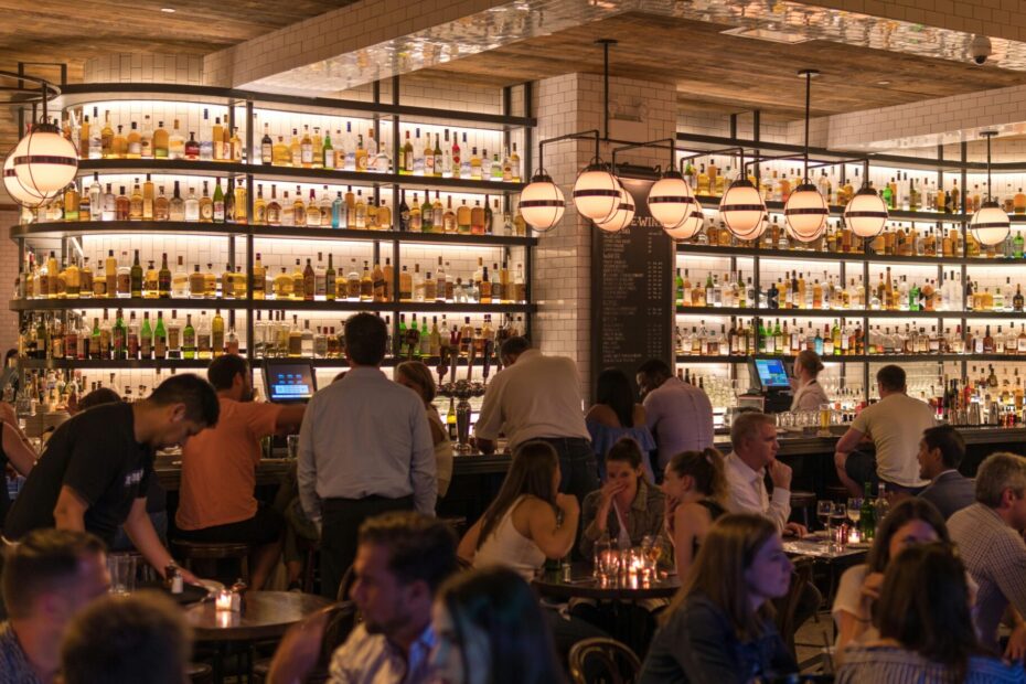 Group of people gathering inside bar